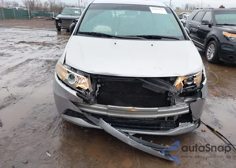 2012 Honda Odyssey Lx z USA, uszkodzony, nr VIN 5FNRL5H21CB044516